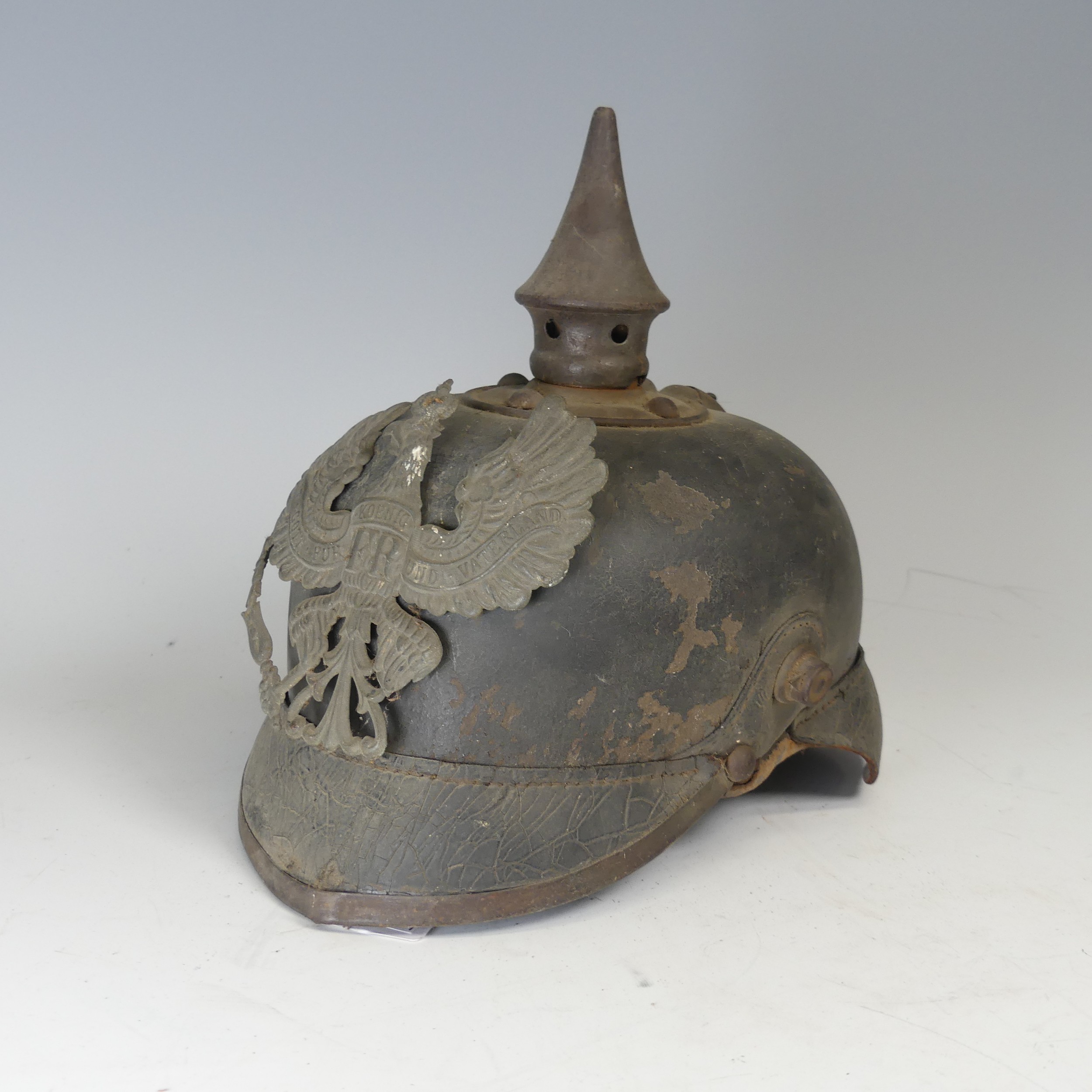 A WWI / Boer period Imperial German Prussian Pickelhaube Helmet, of leather construction, with brass