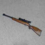 Weihrauch model HW 77 K .22 Air Rifle, with under lever action, beech stock with chequered pistol