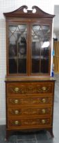 A fine Edwardian mahogany secretaire Bookcase, in George III style, top and base both heavily inlaid