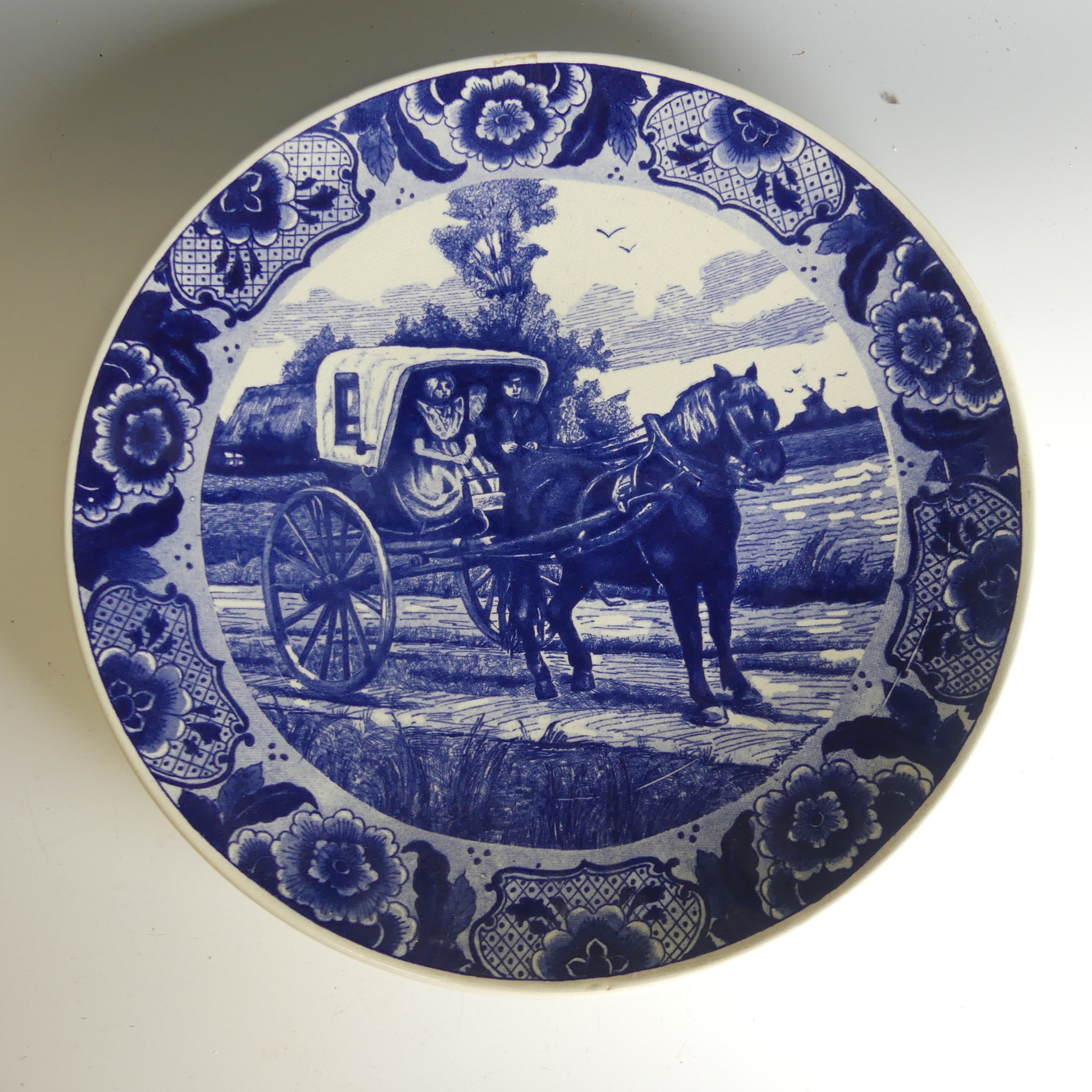 A pair of De Porceleyne Fles Delft pottery Plates, of moulded form, decorated with birds amongst - Image 3 of 10