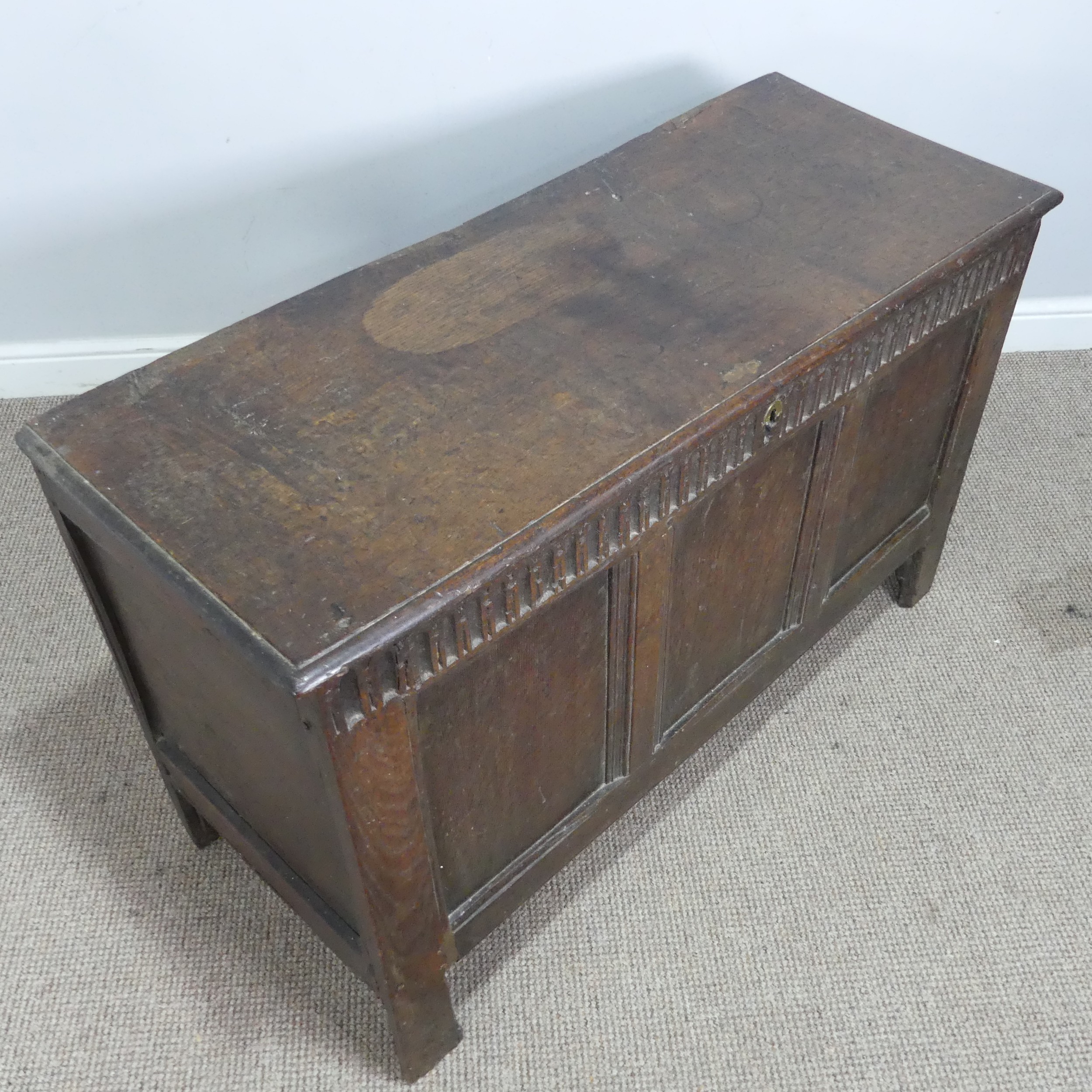 A 17th century and later oak three panel Coffer, rectangular top over carved frieze and three - Bild 2 aus 15