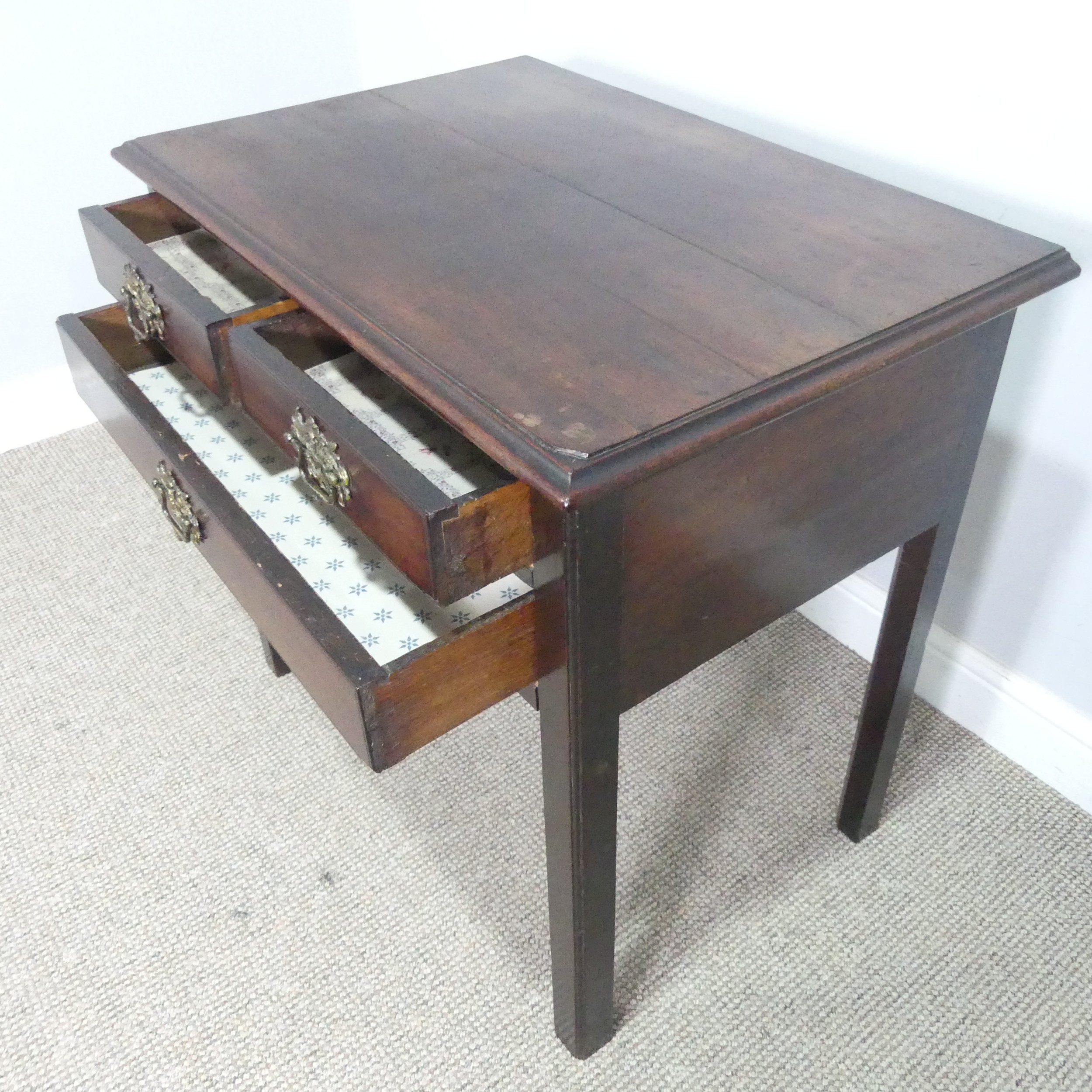 A Georgian oak Lowboy, shaped top over three drawers and square canted legs, W 75.5 cm x H 71 cm x D - Image 4 of 6