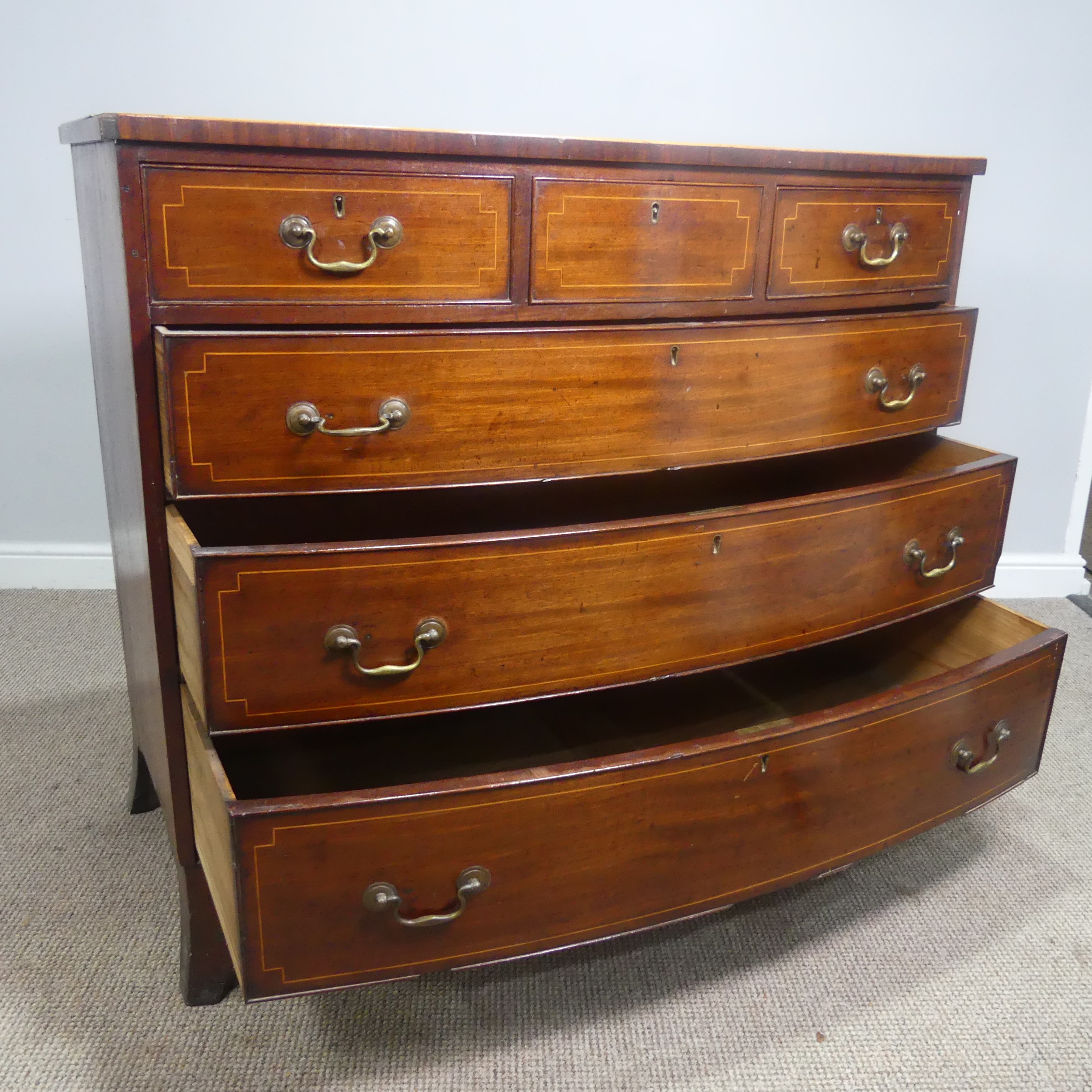 A Georgian mahogany bow-front Chest of drawers, three small drawers over three long graduating - Image 10 of 10