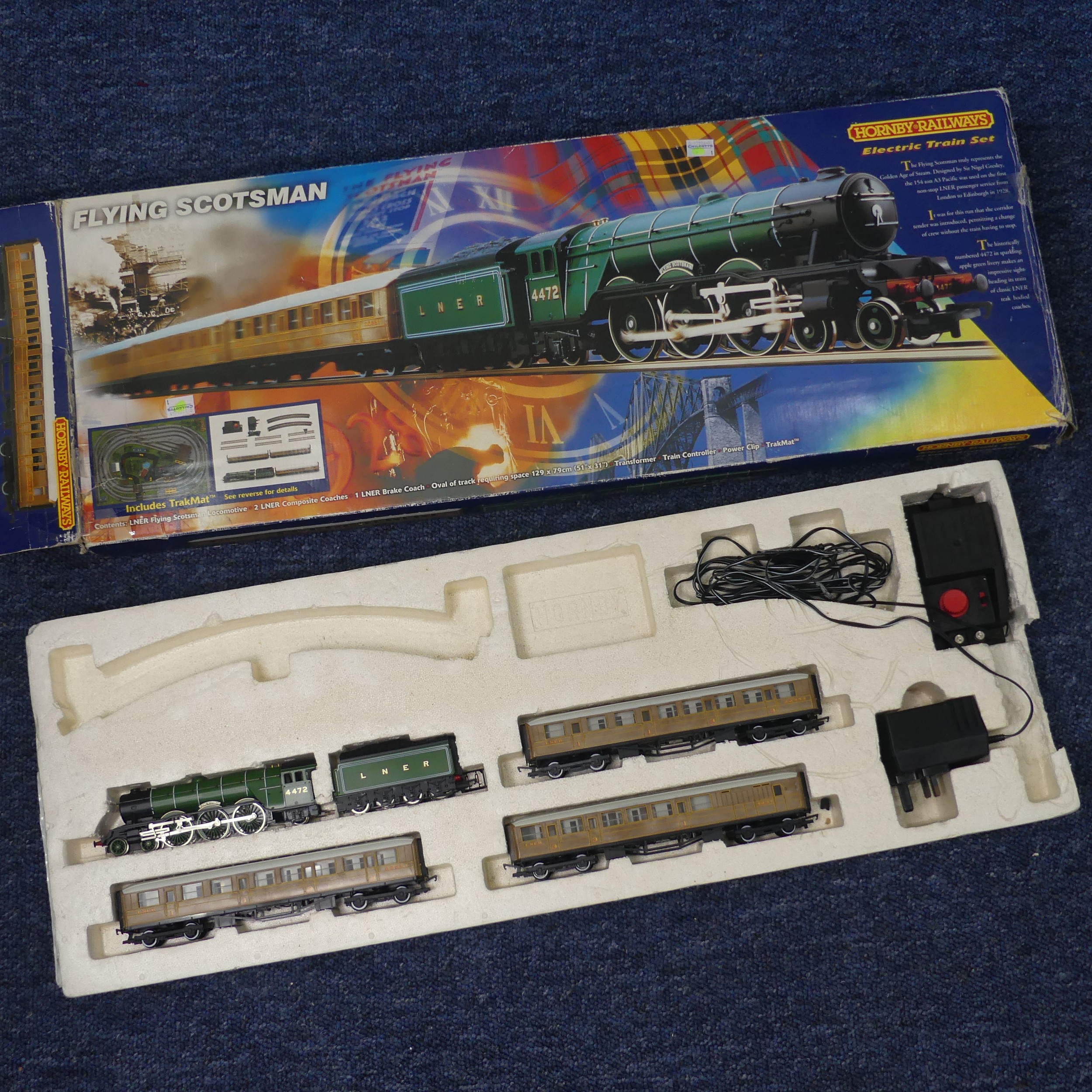 A Hornby Railways '00' gauge Flying Scotsman electric train set, boxed with TrakMat, lacks power