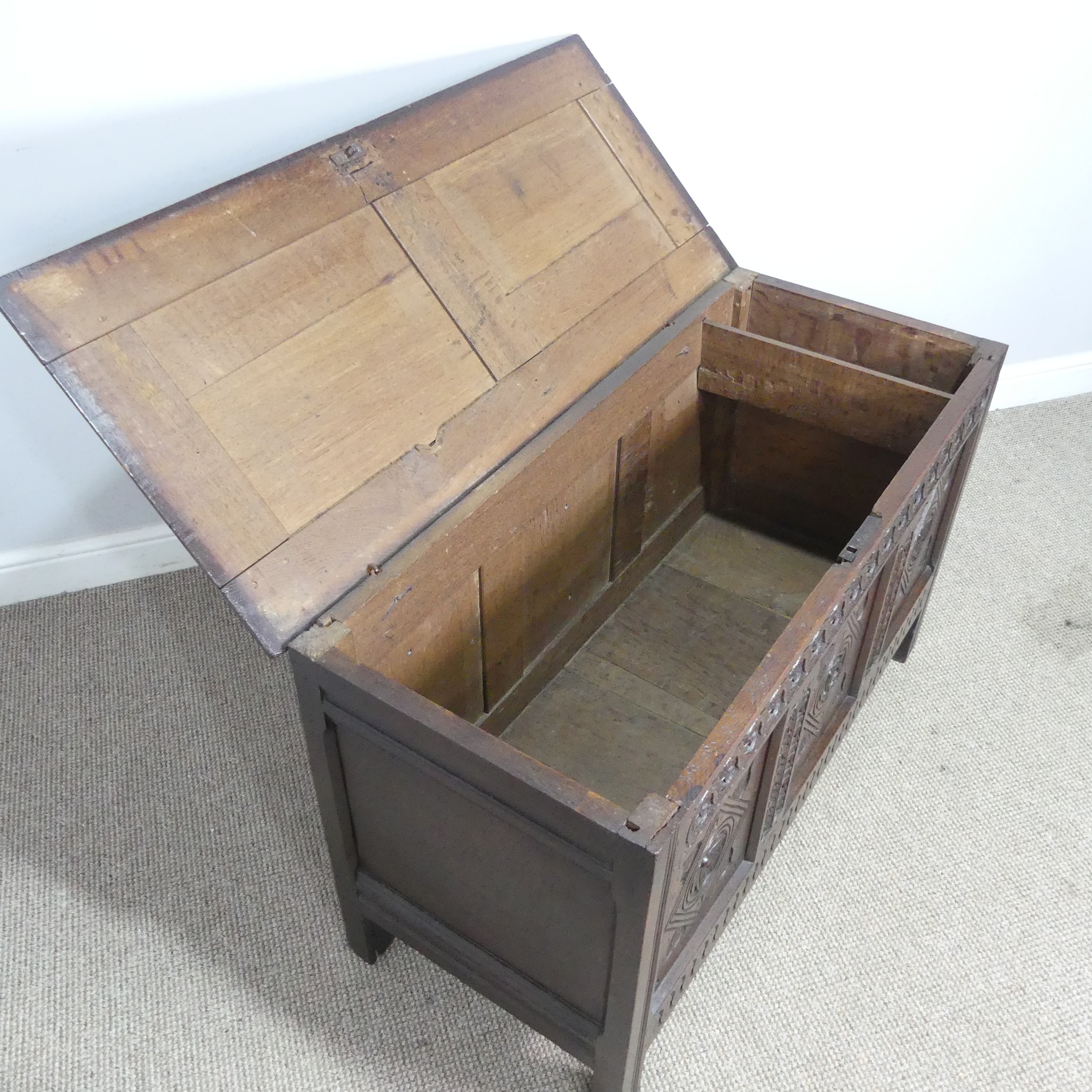 A 17th century oak Coffer, two panelled rectangular top with original pin hinges, over three - Bild 6 aus 12