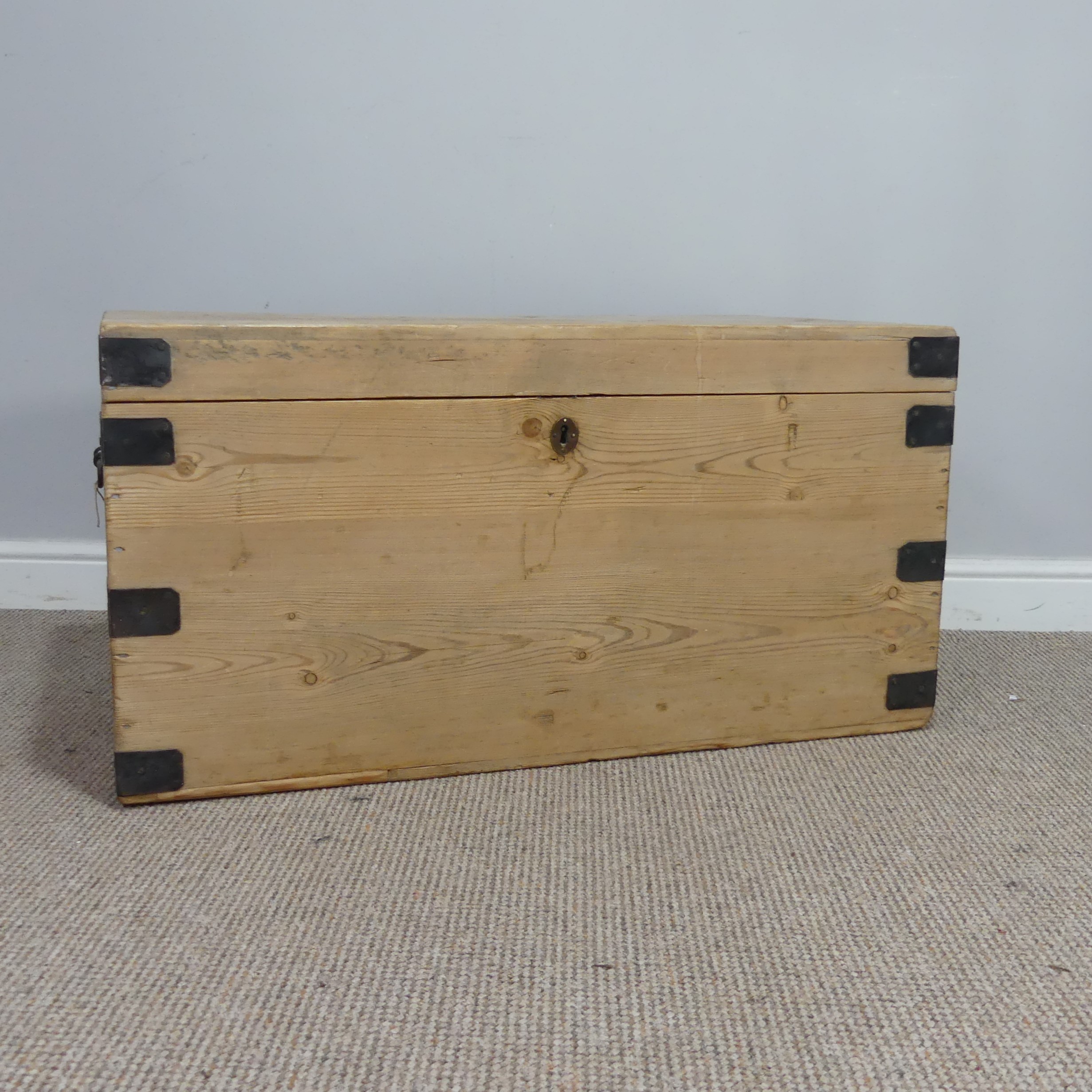 An antique stripped pine and iron bound Blanket Box, W 92 cm x H 48.5 cm x D 49 cm.