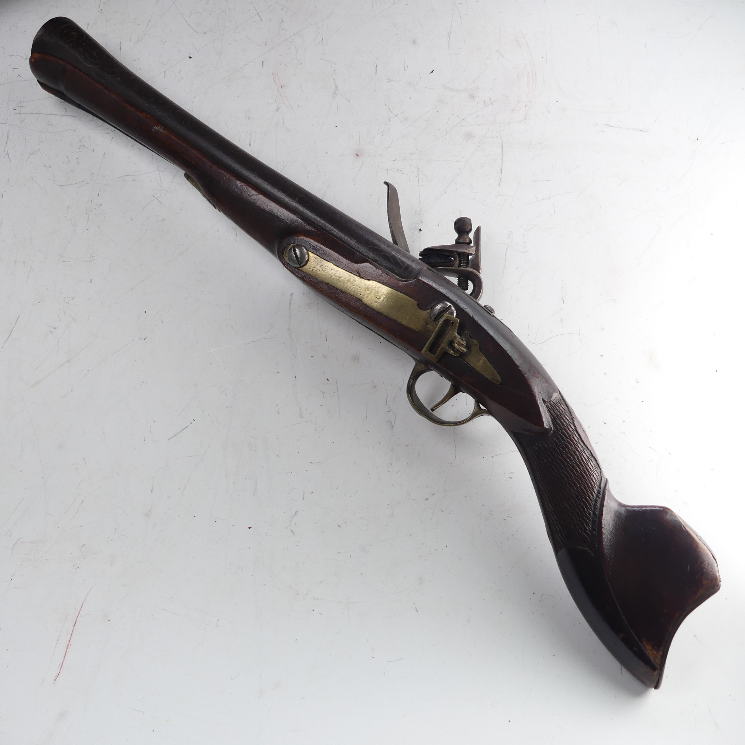 A 19th century flintlock 'knee' Blunderbuss, 11 inch engraved steel barrel flared to the muzzle,