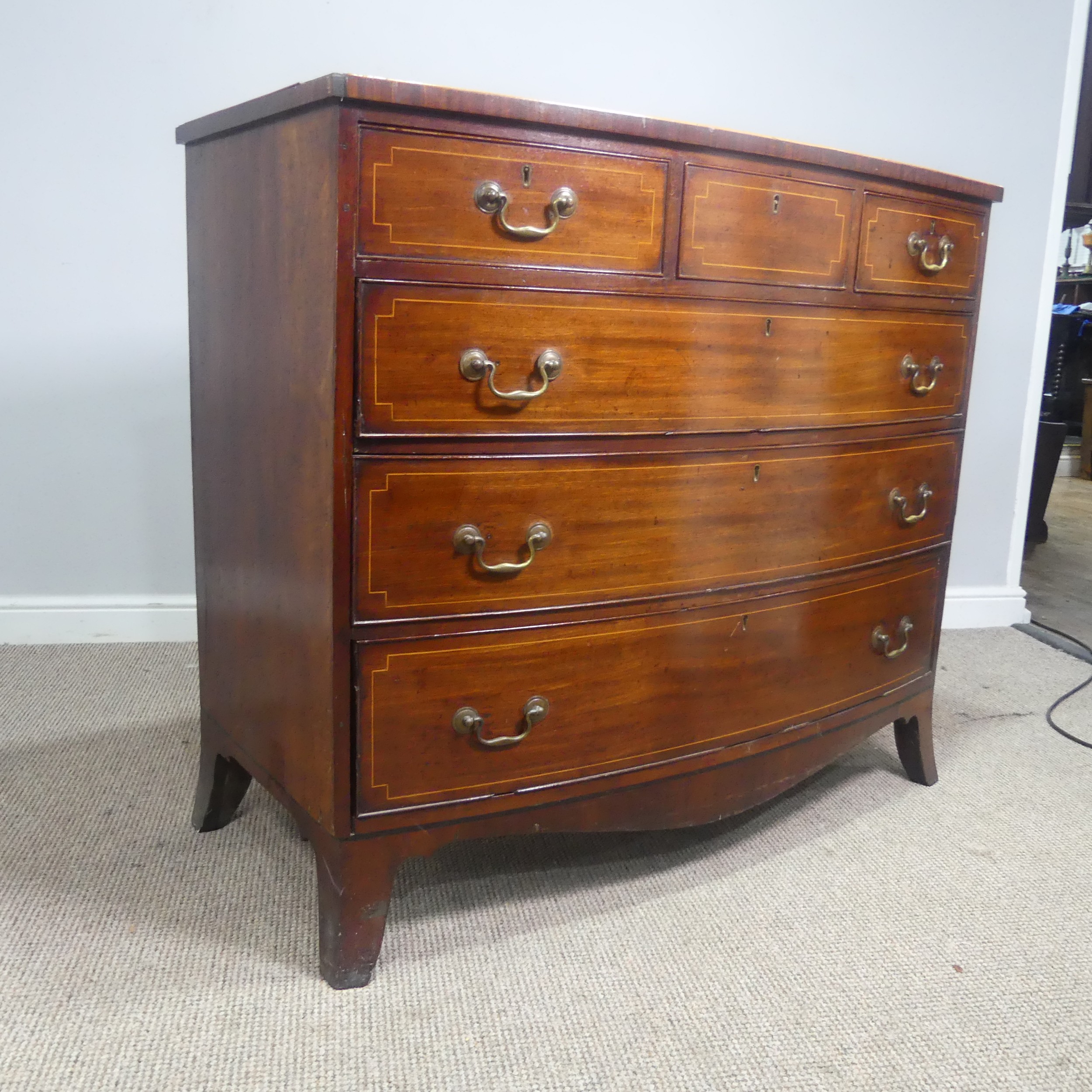 A Georgian mahogany bow-front Chest of drawers, three small drawers over three long graduating - Image 2 of 10