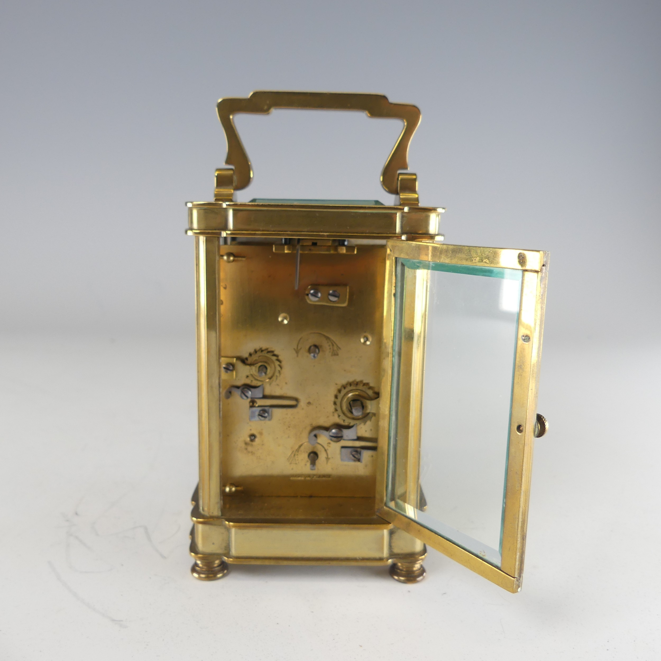 A 20th century French alarm carriage Clock, enamelled white dial with Roman numerals and - Image 7 of 9