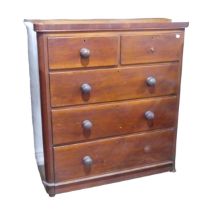 An antique mahogany Chest of drawers, of large proportions, with rounded corners and edges,