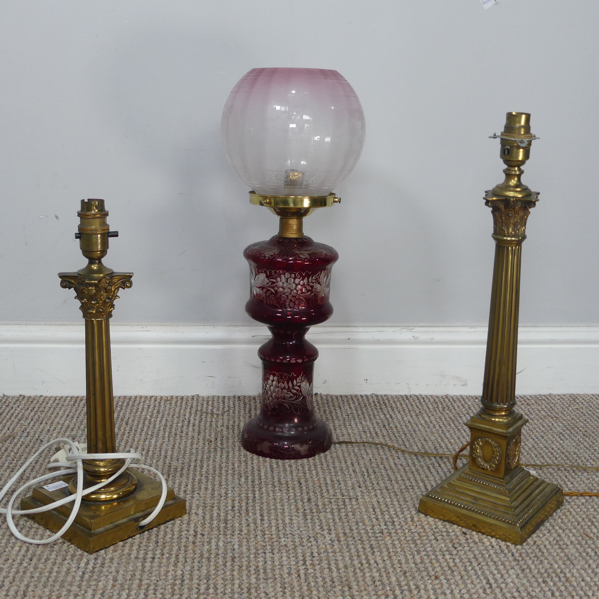 An antique ruby glass electrified Oil Lamp, with etched glass shade, H 49 cm, together with two - Image 4 of 6