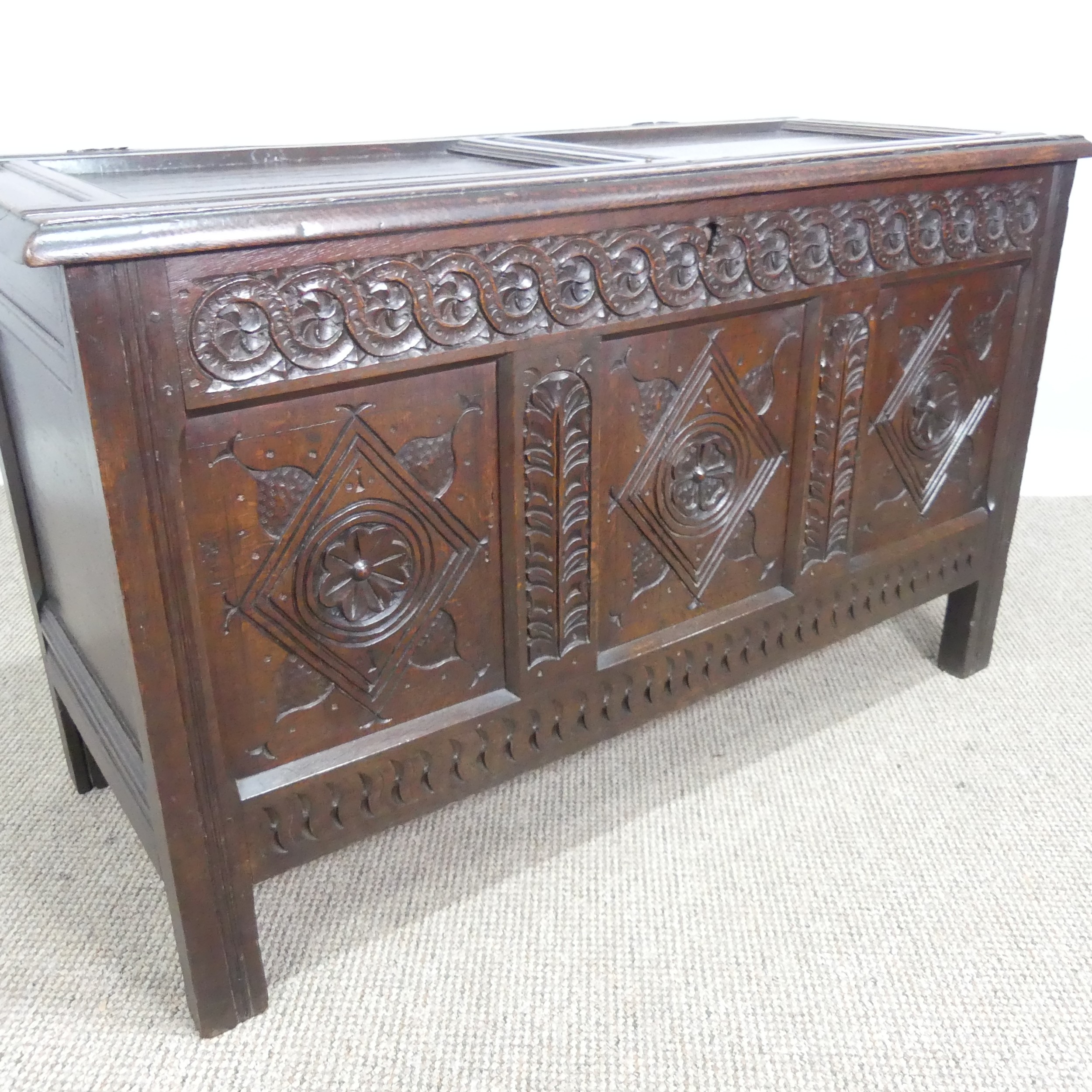 A 17th century oak Coffer, two panelled rectangular top with original pin hinges, over three - Bild 2 aus 12