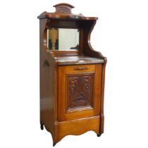 An Edwardian mahogany coal Purdonium, serpentine top above mirror, over marble slab and hinged lined