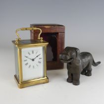 An early 20th century carriage Clock, in fitted leather case, the white enamel dial with Roman