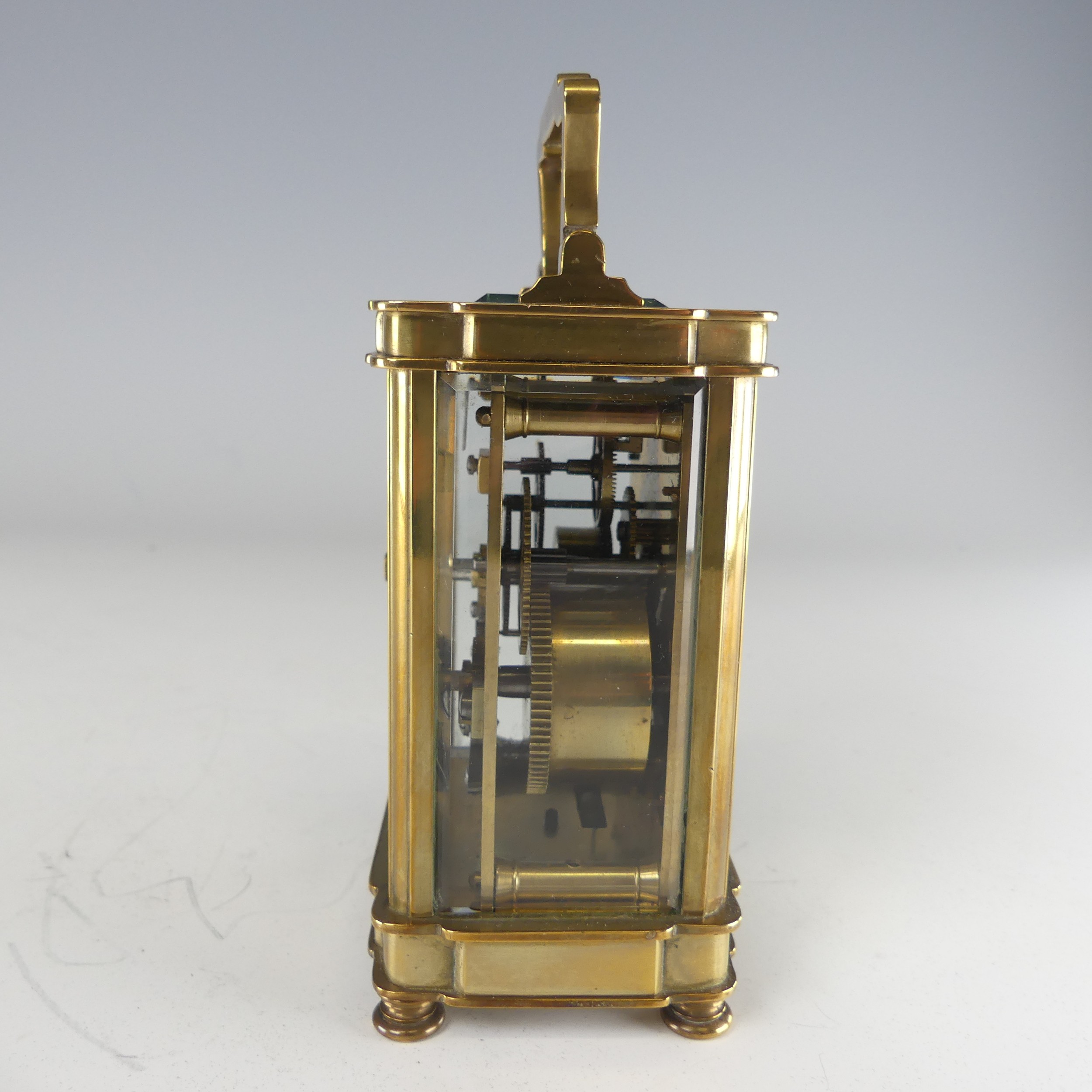 A 20th century French alarm carriage Clock, enamelled white dial with Roman numerals and - Image 8 of 9