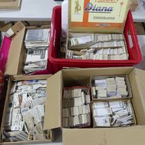 A large quantity of cigarette cards loose and in albums, many complete sets together with a large