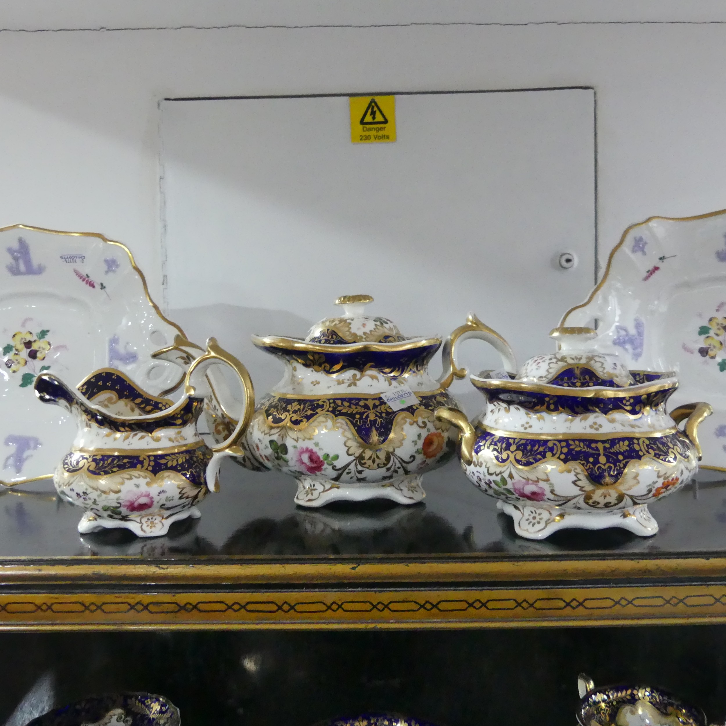 A 19th century Staffordshire part tea set, comprising teapot, sugar basin and cream jug with sixteen