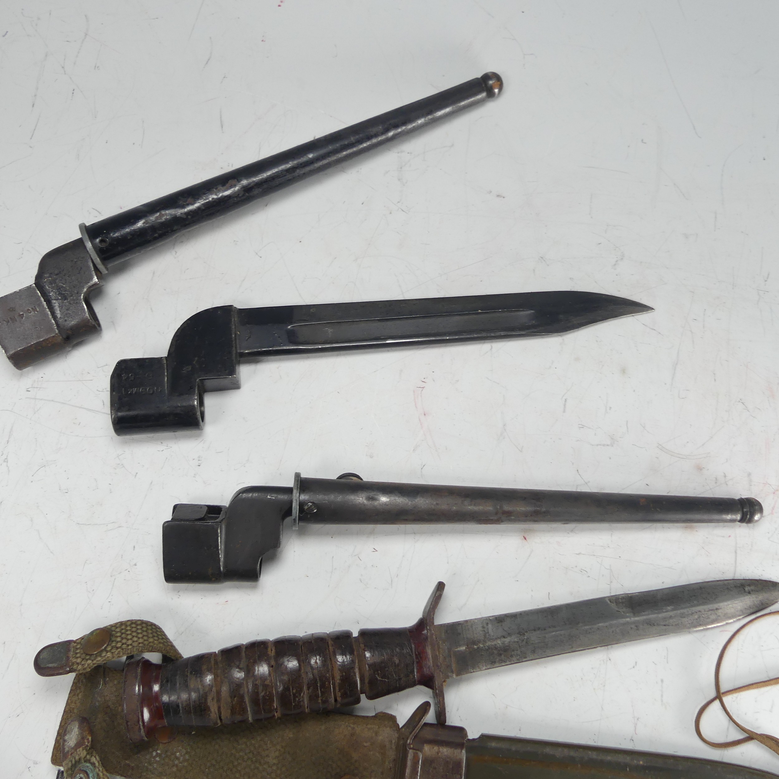 An American USM8 B.M.CO bayonet Knife, with scabbard and material fittings, together with three - Image 6 of 6