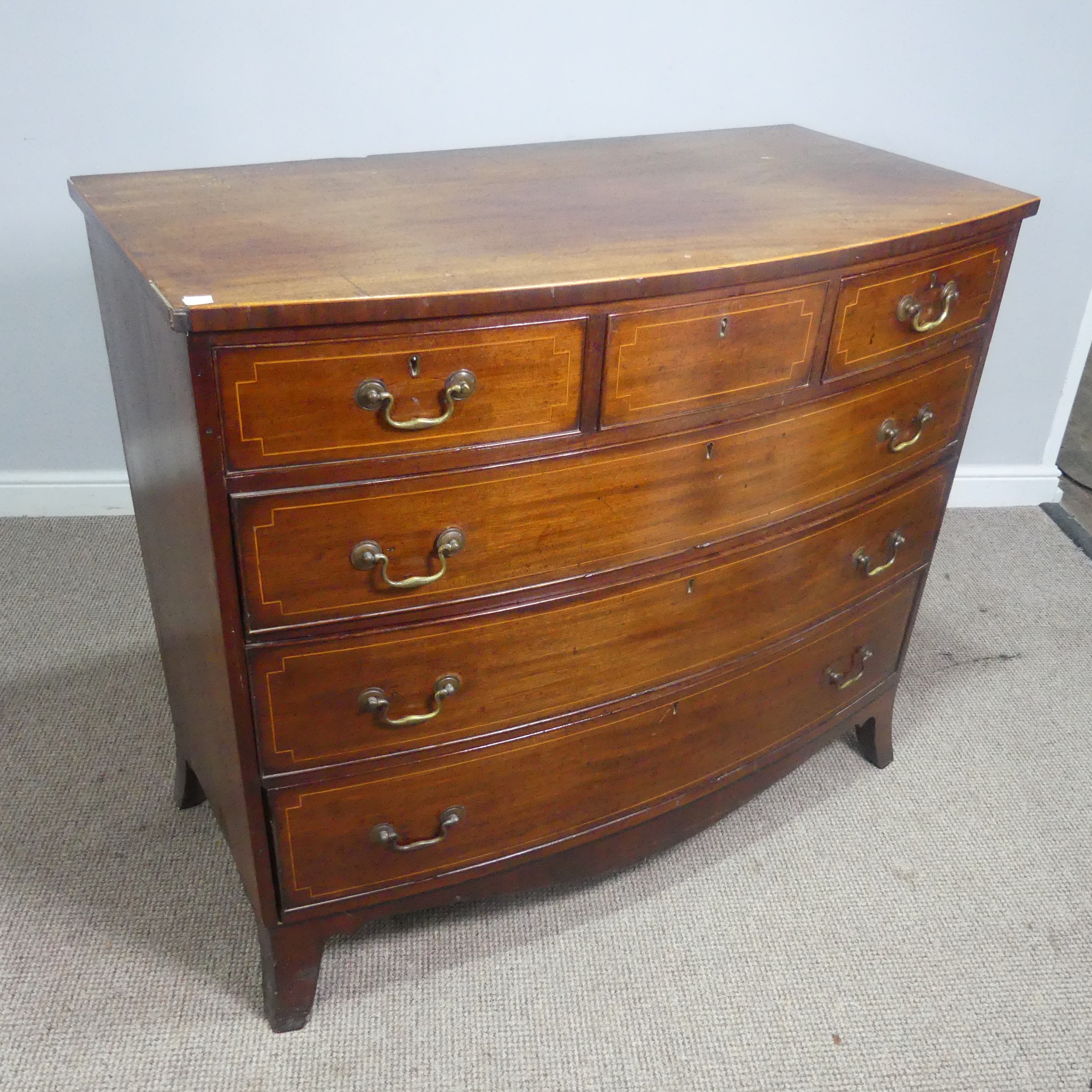 A Georgian mahogany bow-front Chest of drawers, three small drawers over three long graduating - Image 3 of 10
