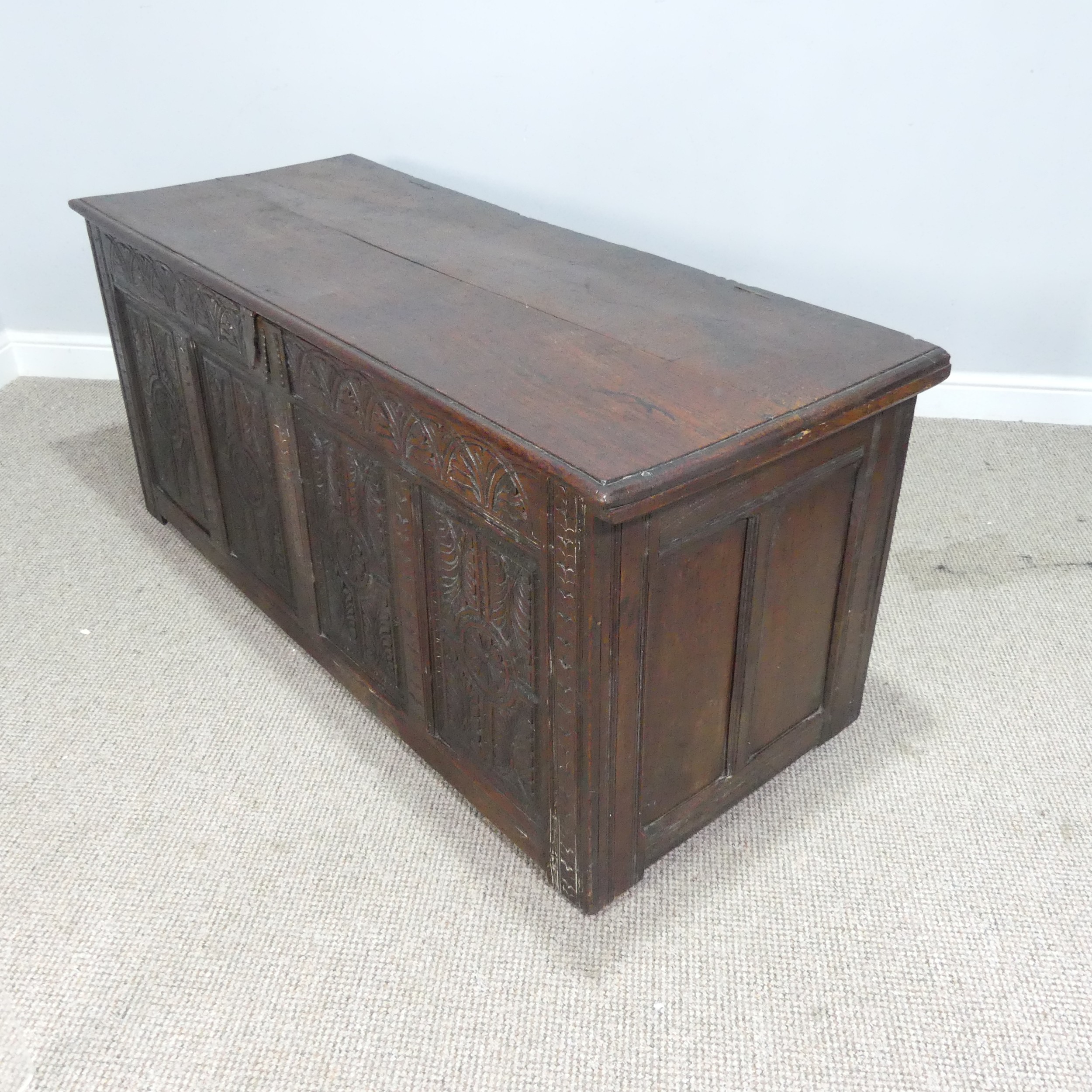 A 17th century and later oak Coffer, rectangular plank top over 17th century carved panels, raised - Bild 11 aus 11