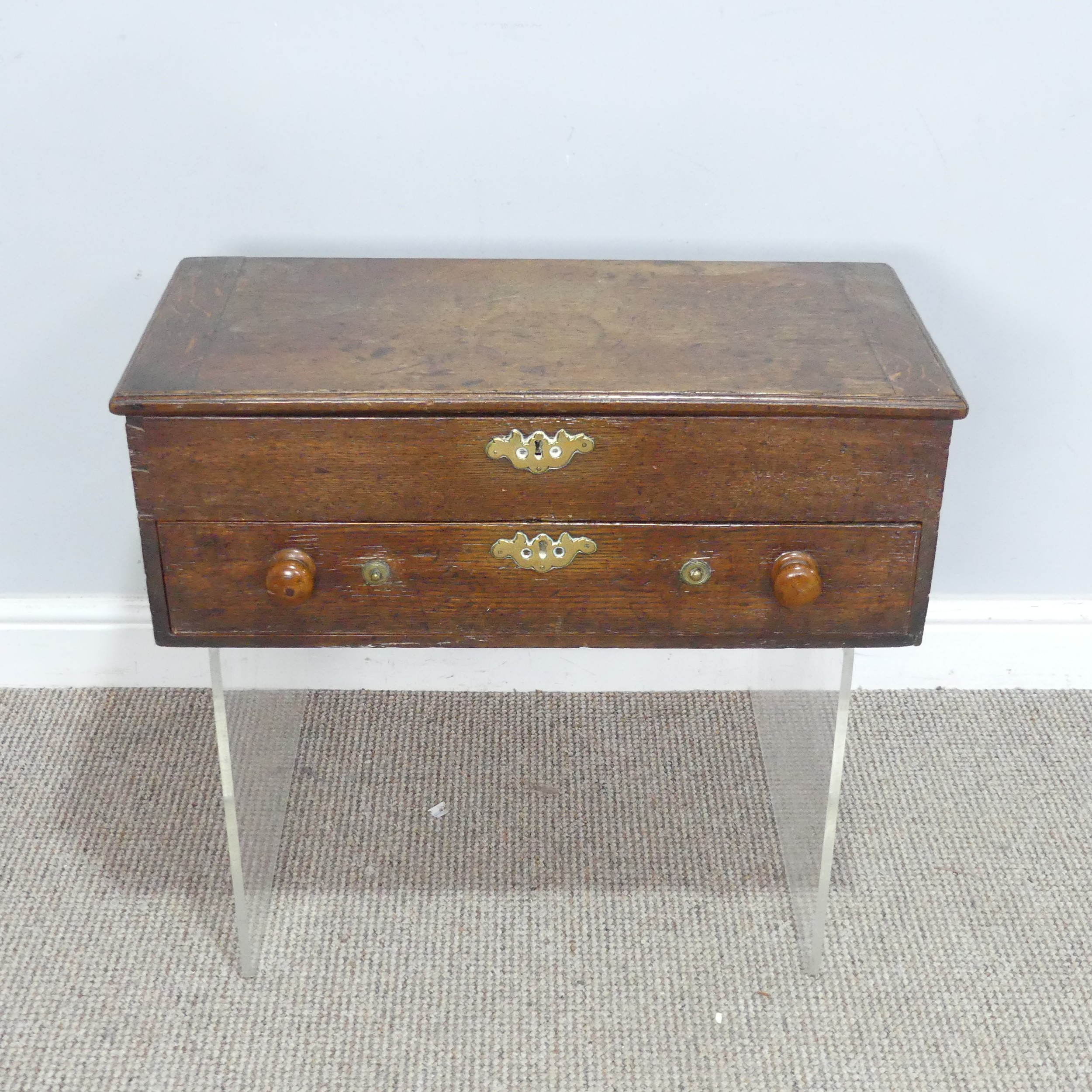 An 18th century oak Bible Box, hinged top over single drawer, with replacement turned handles,