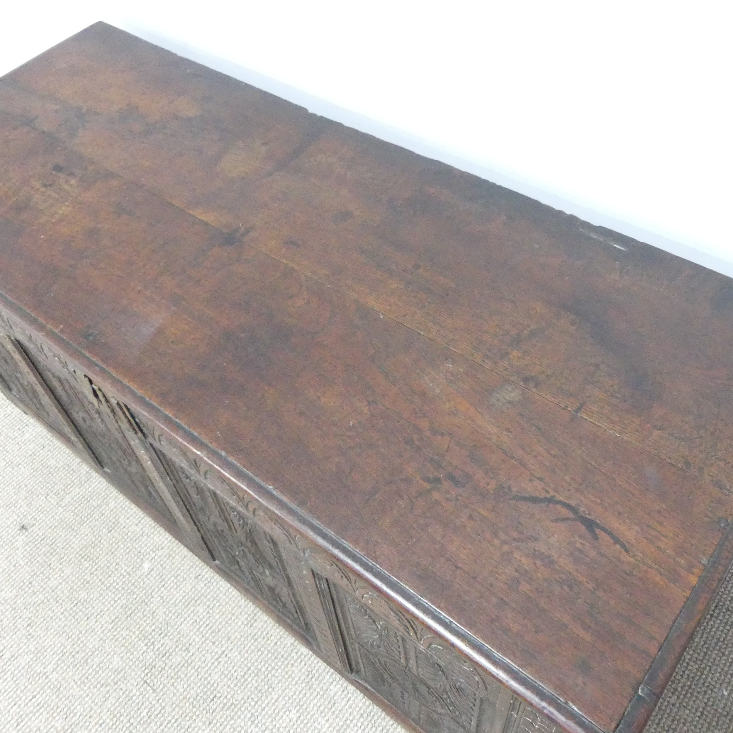 A 17th century and later oak Coffer, rectangular plank top over 17th century carved panels, raised - Bild 4 aus 11
