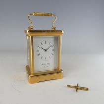 An early 20th century English striking carriage Clock, by Morrell & Hilton, the white enamelled dial
