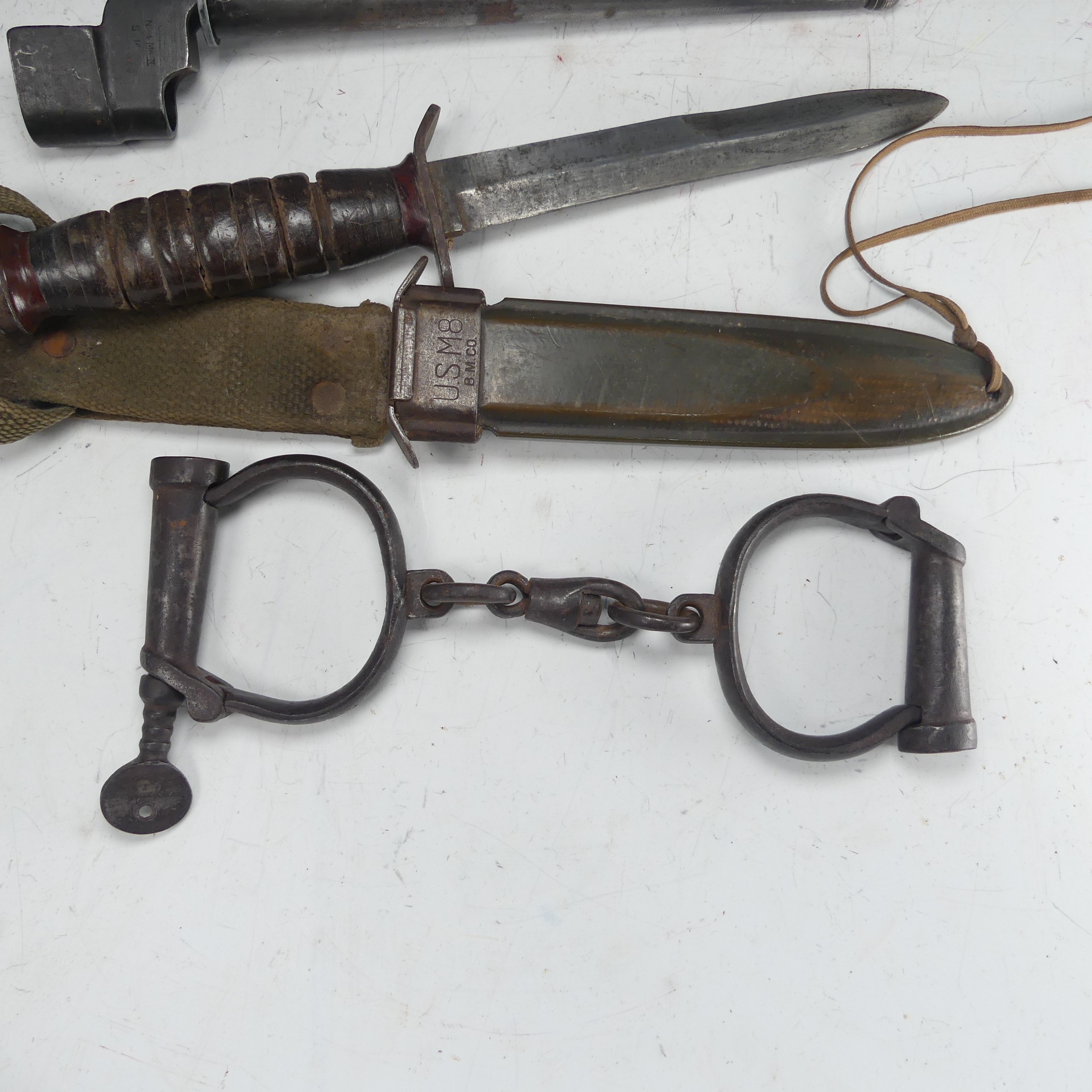 An American USM8 B.M.CO bayonet Knife, with scabbard and material fittings, together with three - Image 5 of 6