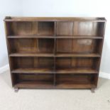 An antique stained pine open Bookcase, top with three quarter gallery, over six open shelves, W