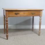 An early 20th century light oak Side Table, with frieze drawer, raise on turned supports, W 92 cm