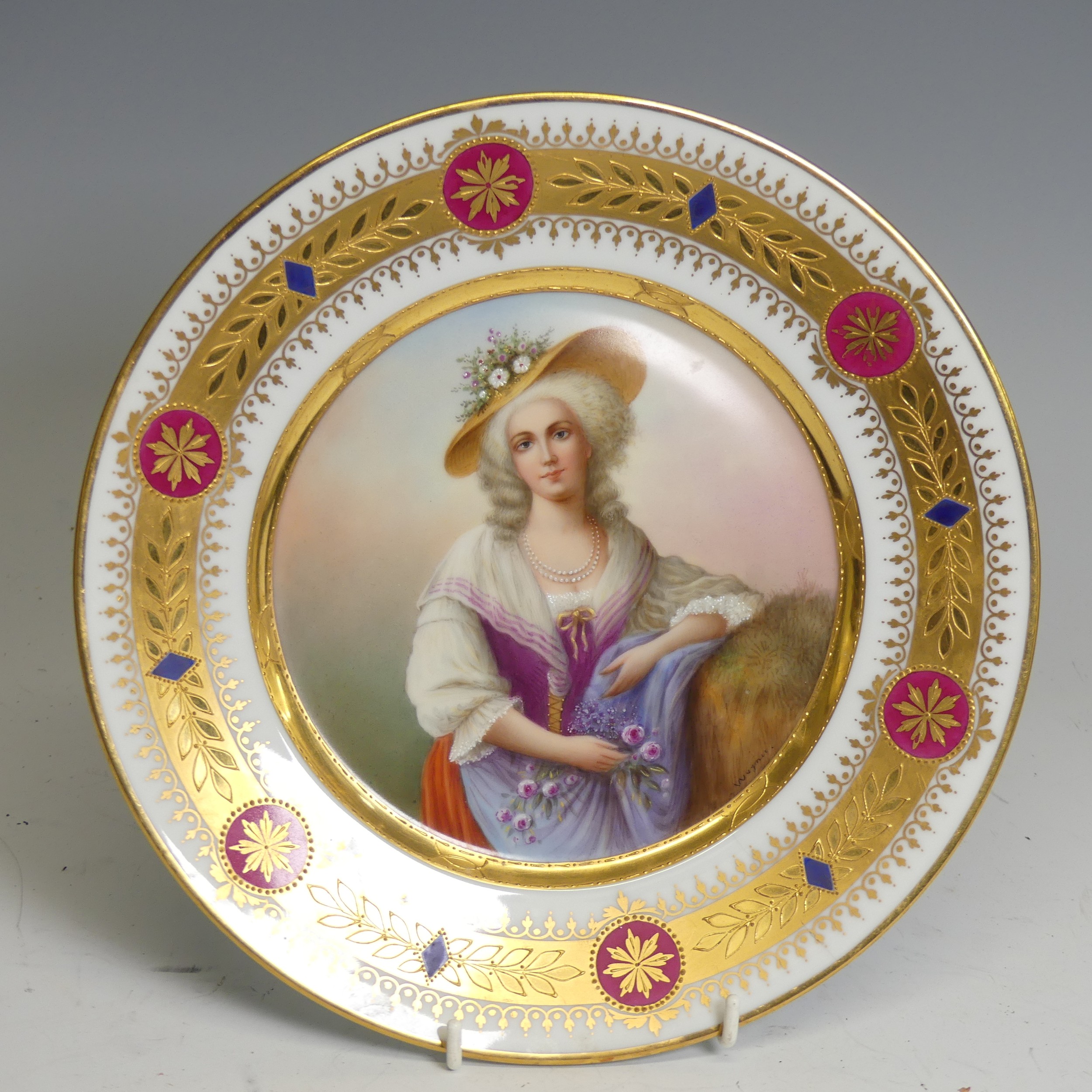 A late 19th century Vienna porcelain hand painted cabinet plate, signed 'Wagner', and titled '