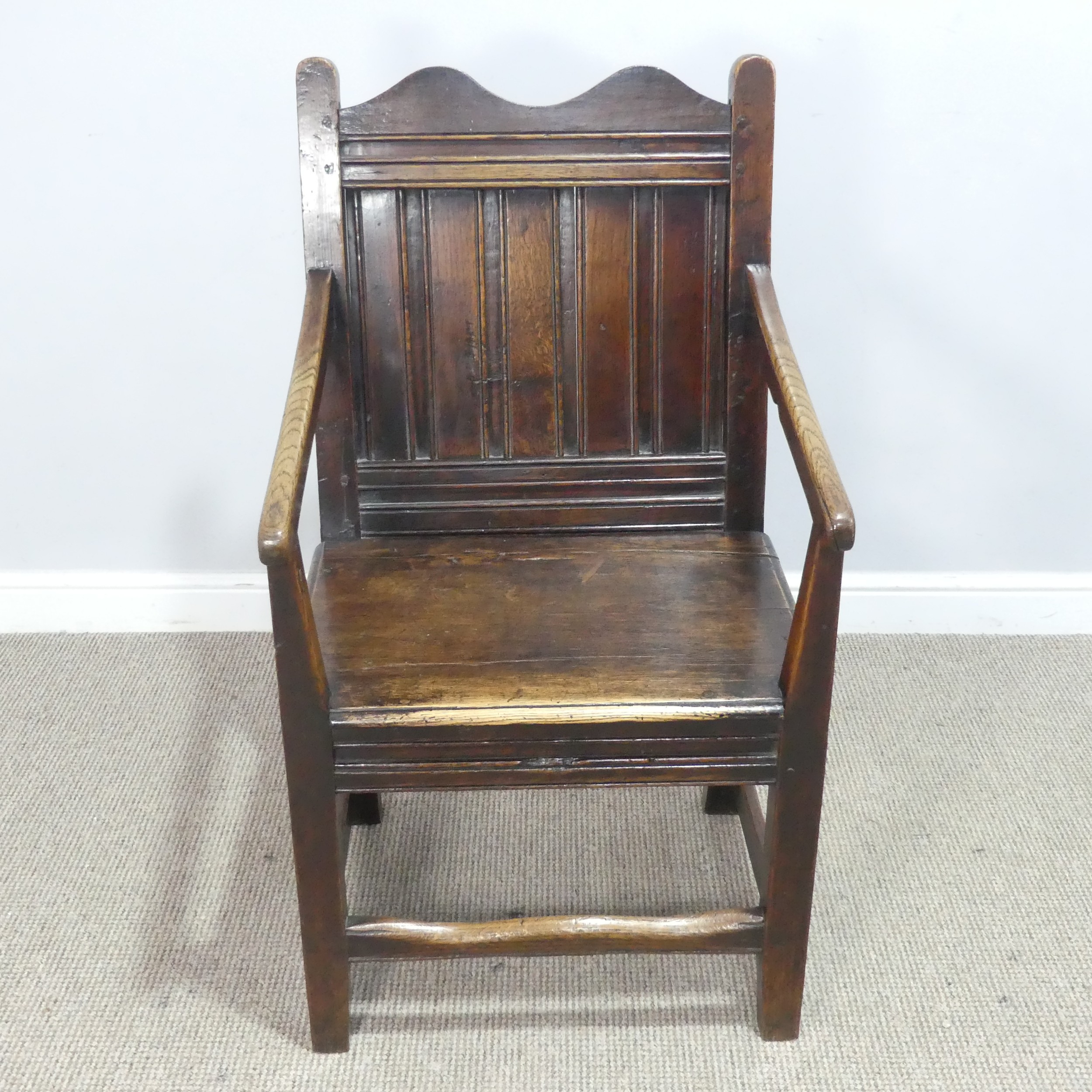 An 18th century wainscot style oak Armchair, shaped headrest over panelled backrest and flanked by - Image 5 of 5