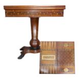 A 19th century Irish Killarney marquetry and yew games Table, hinged rectangular top inlaid with