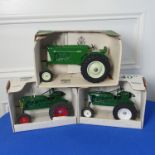 A boxed Spec-cast Oliver 880 Tractor in green,