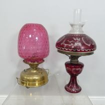 Two Cranberry Glass oil lamps, now converted to electricity(2)
