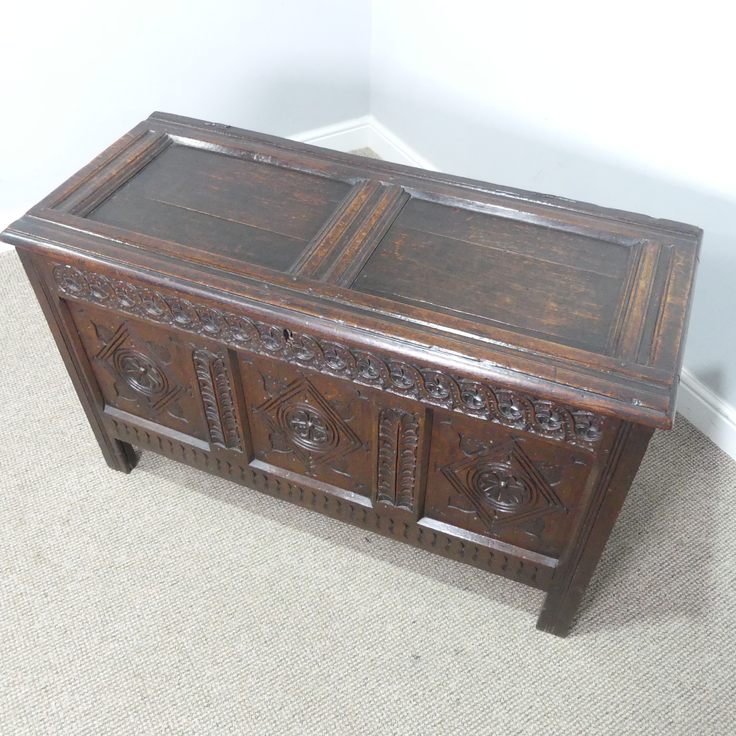 A 17th century oak Coffer, two panelled rectangular top with original pin hinges, over three - Bild 5 aus 12