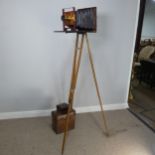 A London Stereoscopic Co. Folding Studio Plate Camera, mahogany and brass with leather bellows and