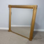 A large gilt overmantle hall wall Mirror, of square proportions, reeded column supports, W 134 cm