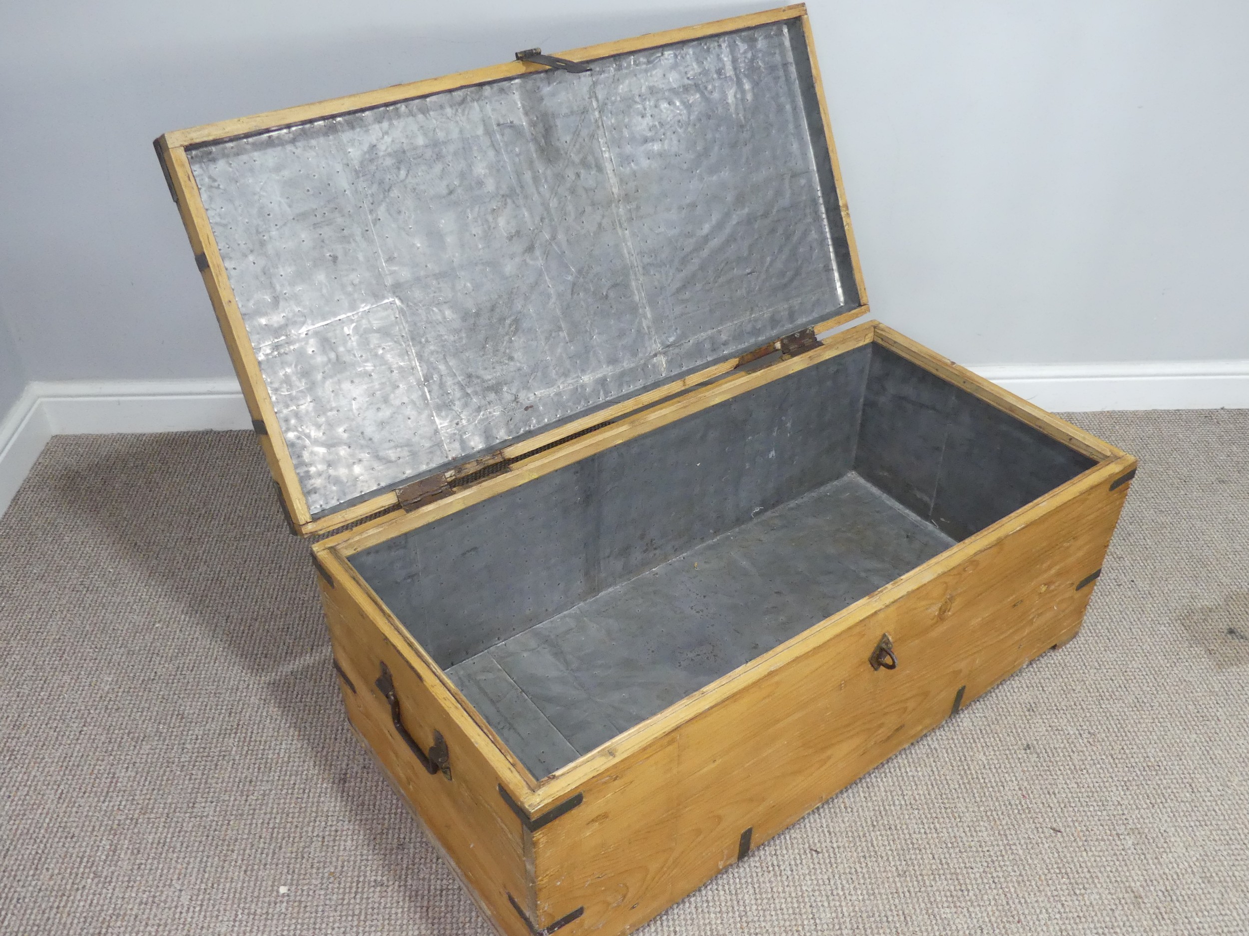 A large antique pine and metal bound Trunk, metal lined, W 107 cm x H 43 cm x D 54 cm. - Image 2 of 2