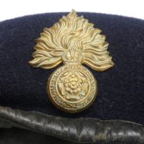 An early post WW2 British army Beret, navy cloth with black leather trim, black cloth lining with “