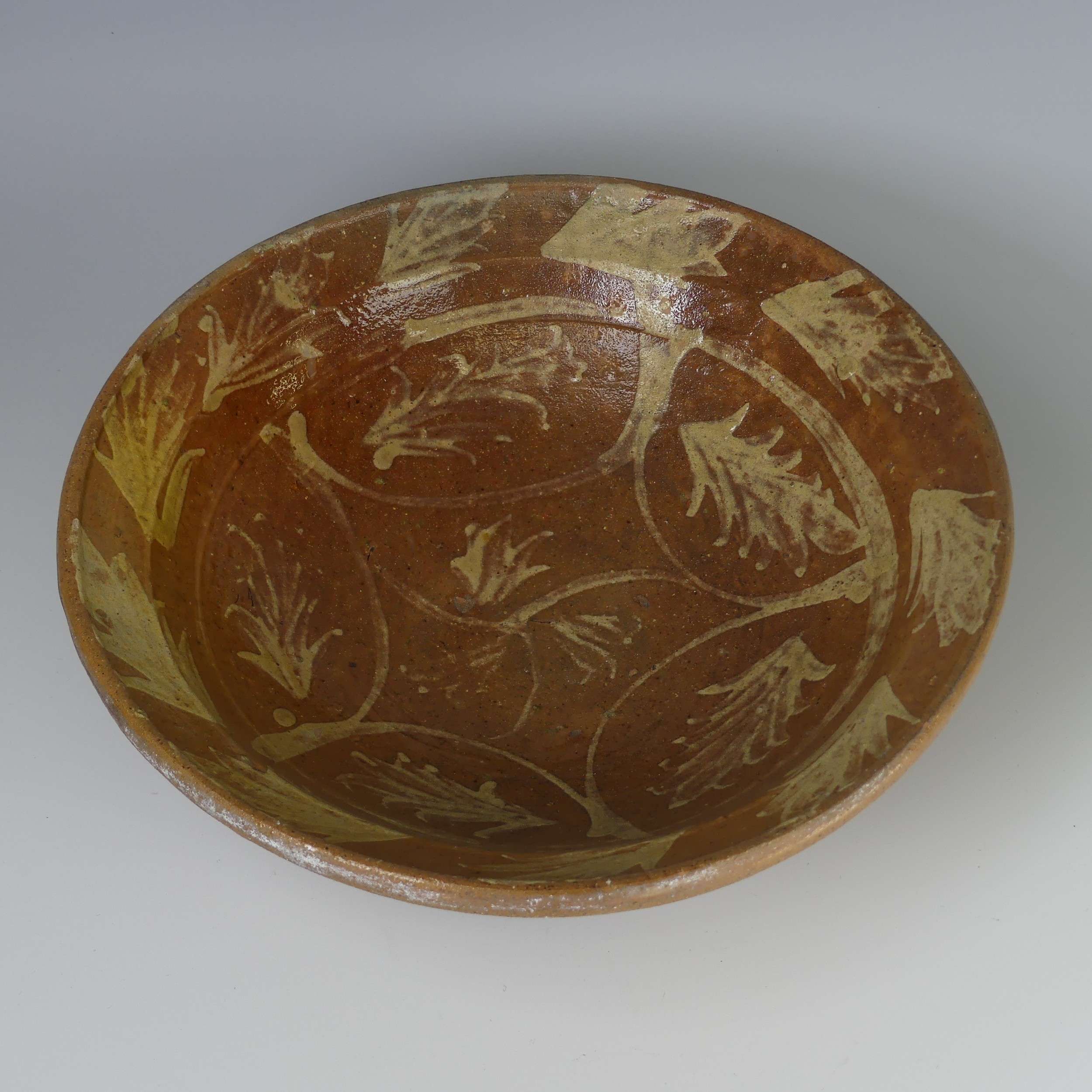 An antique earthenware pottery Bowl, decorated with slipware leaves, D 29cm x H 9.5cm, together with - Image 2 of 7