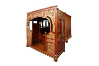 A LARGE CHINESE WOOD OPIUM BED