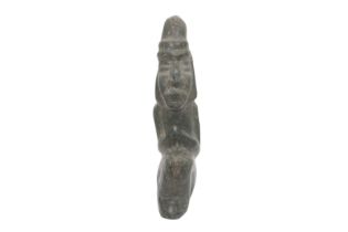 A PRE-COLOMBIAN OR POLYNESIAN STONE FIGURAL CARVING