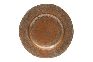 AN ENGRAVED TINNED COPPER DISH, POSSIBLY BUKHARA, LATE 19TH CENTURY