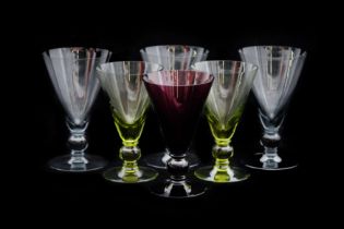 A GROUP OF WINE GLASSES