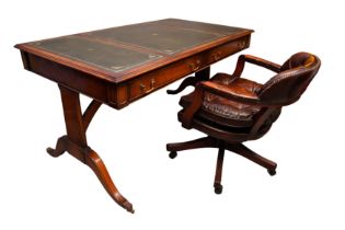 A REGENCY STYLE MAHOGANY TWO-DRAWER WRITING DESK WITH A LEATHER CAPTAIN DESK CHAIR