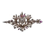 A DIAMOND AND RUBY BROOCH