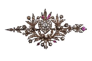 A DIAMOND AND RUBY BROOCH