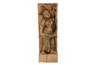 A CARVED WOODEN WALL HANGING STATUE OF A WINGED APSARA,