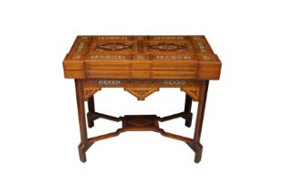 AN EARLY 20TH CENTURY SYRIAN, DAMASCUS INLAID FOLDING GAMES TABLE